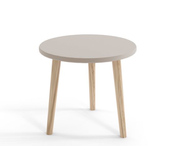 Okrągły stolik kawowy w kolorze kaszmir, na smukłych, wysokich nogach, o nowoczesnym, minimalistycznym designie.